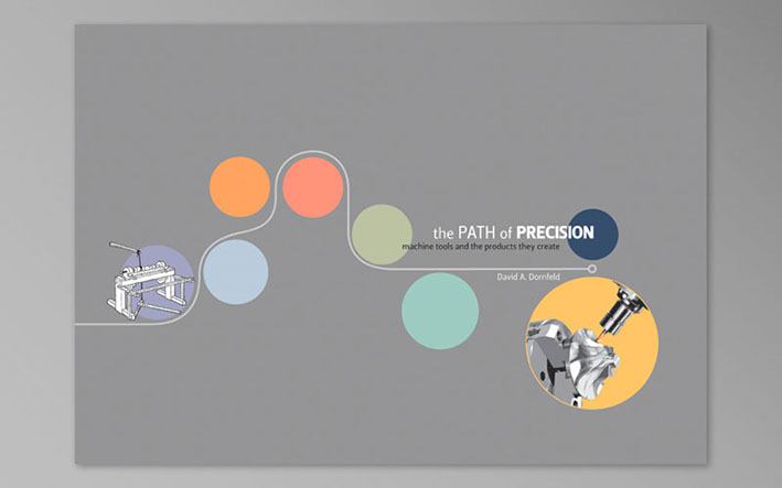 Photo of the book cover of a corporate history book. A hardcover binding covered with a printed and laminated image.